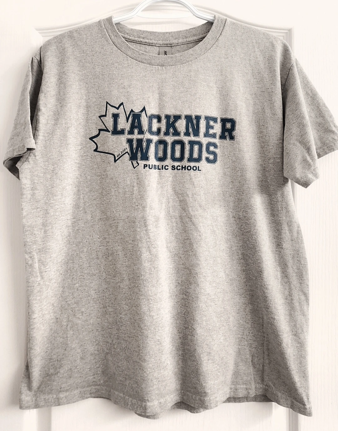 Lackner Woods school shirt in kids XLg. Pick up in Kitchener, $6