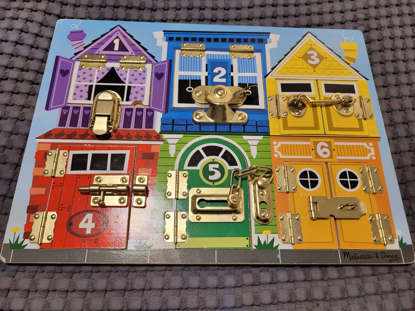 Melissa & Doug Latches Board