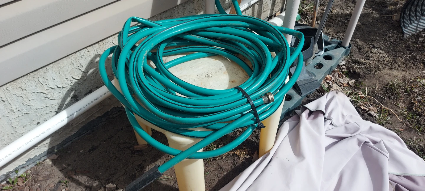 Teal Garden Hose and steel hose.hanger