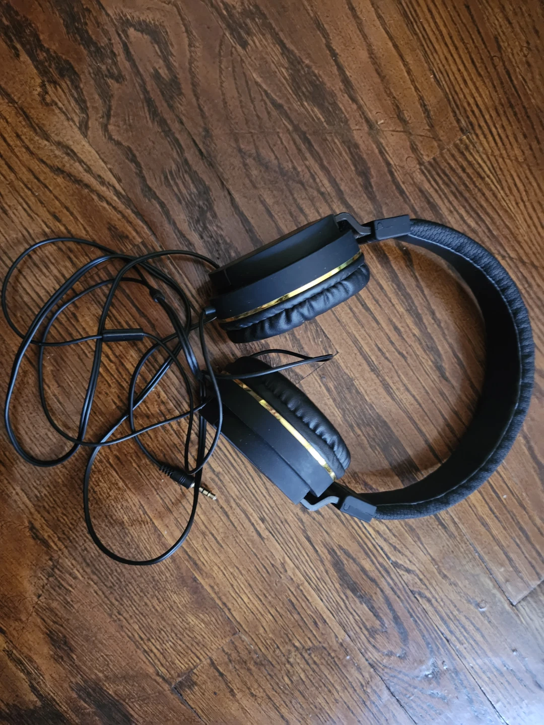 Black Over-Ear Headphones with Gold Accents
