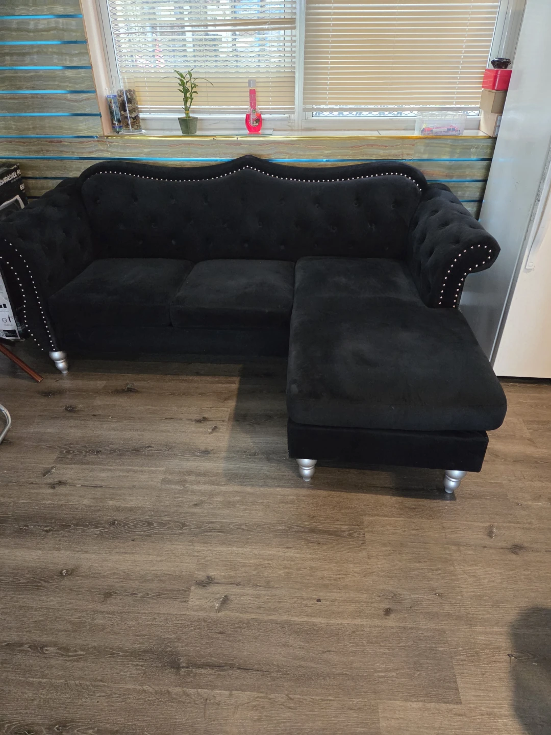 Black Velvet Tufted Sectional Sofa with Silver Legs