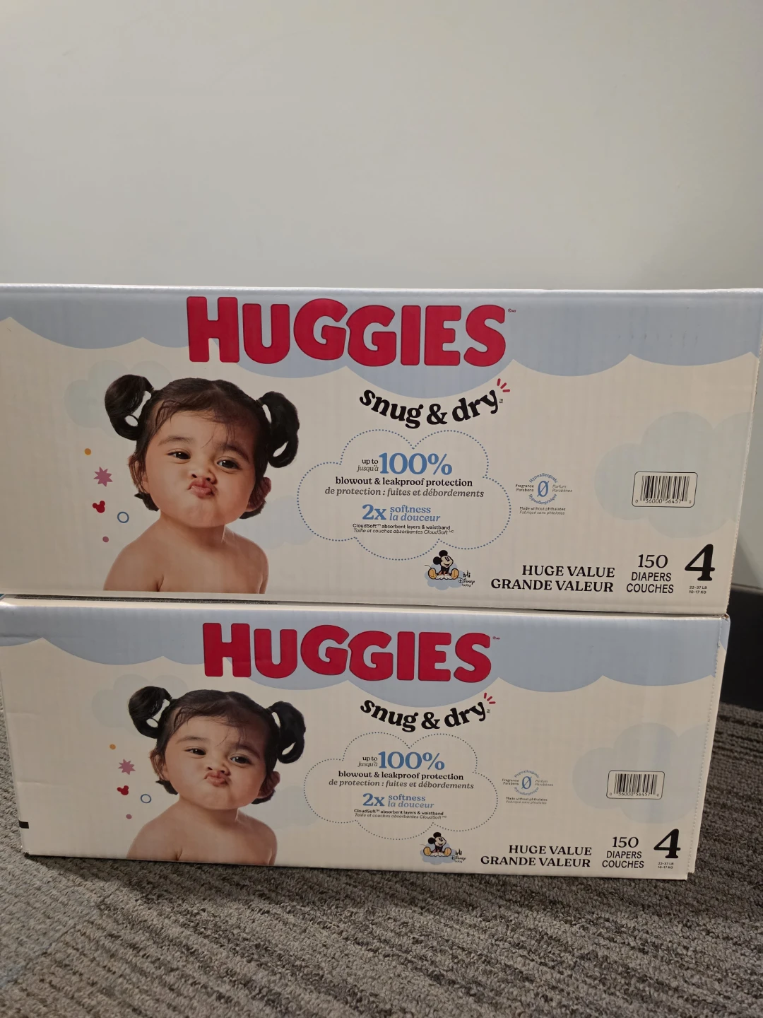 2 boxes Diapers Size 4