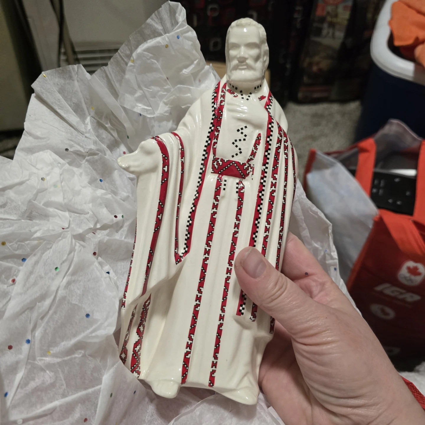 Figurine with Red and Black Traditional Pattern