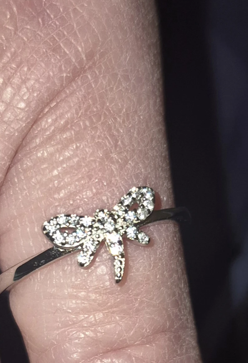 Silver silver 725 ring with a bow-shaped accent - photo 2