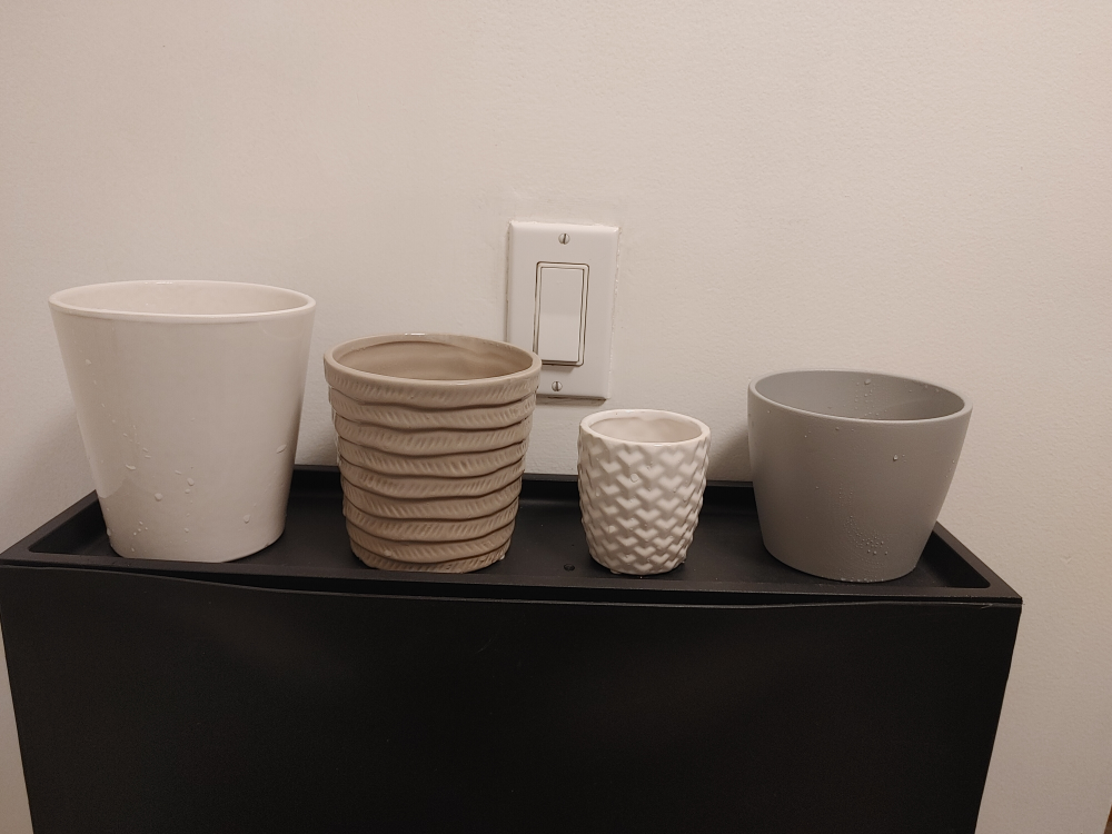 Set of 4 assorted decorative plant pots all fir $10
