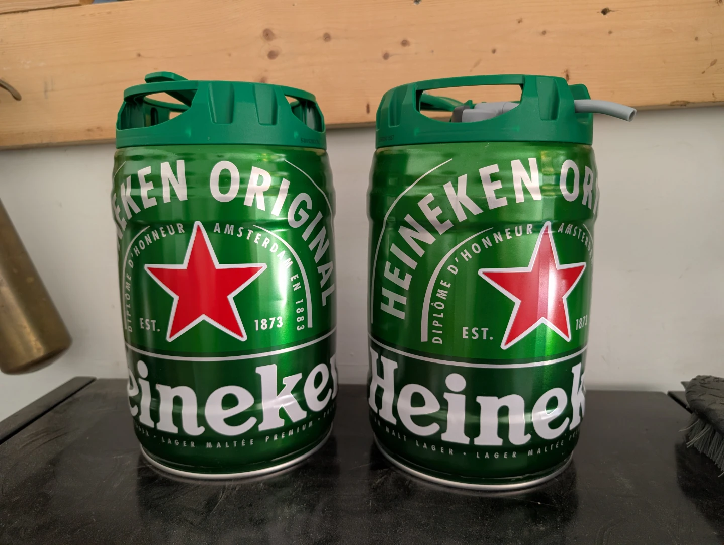 Empty Heineken mini kegs