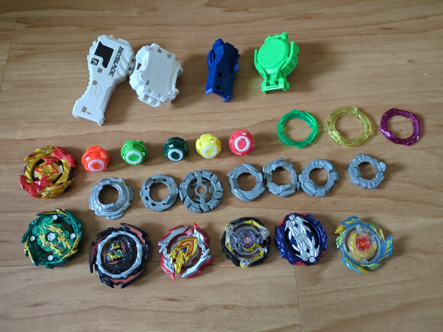 Beyblade lot with launchers and parts
