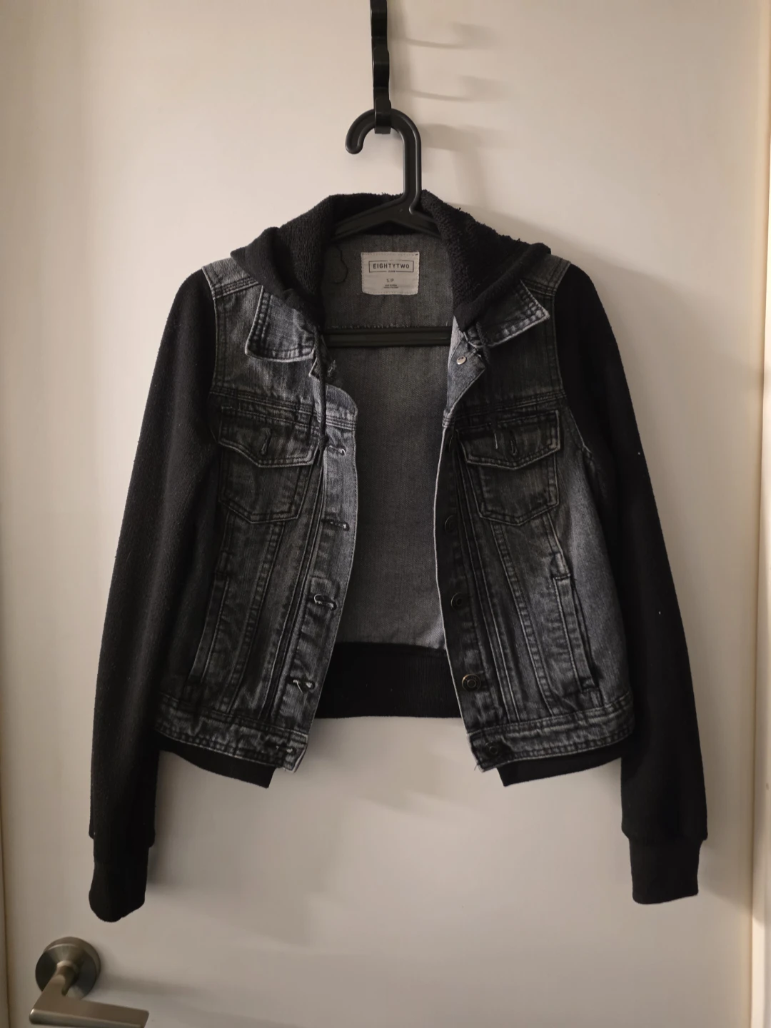 Black jeans and fabric jacket
