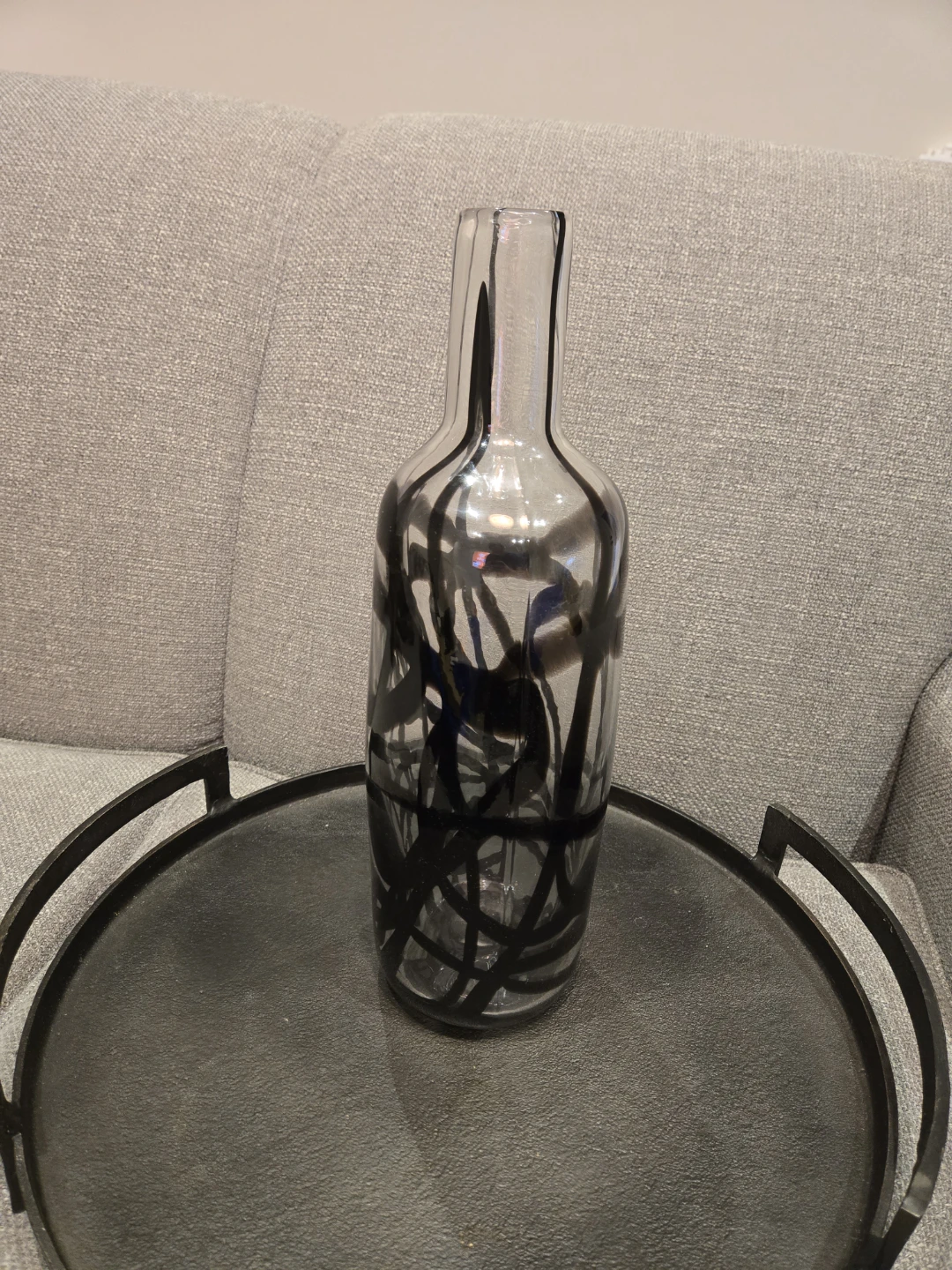 Glass bottle vase with black abstract design