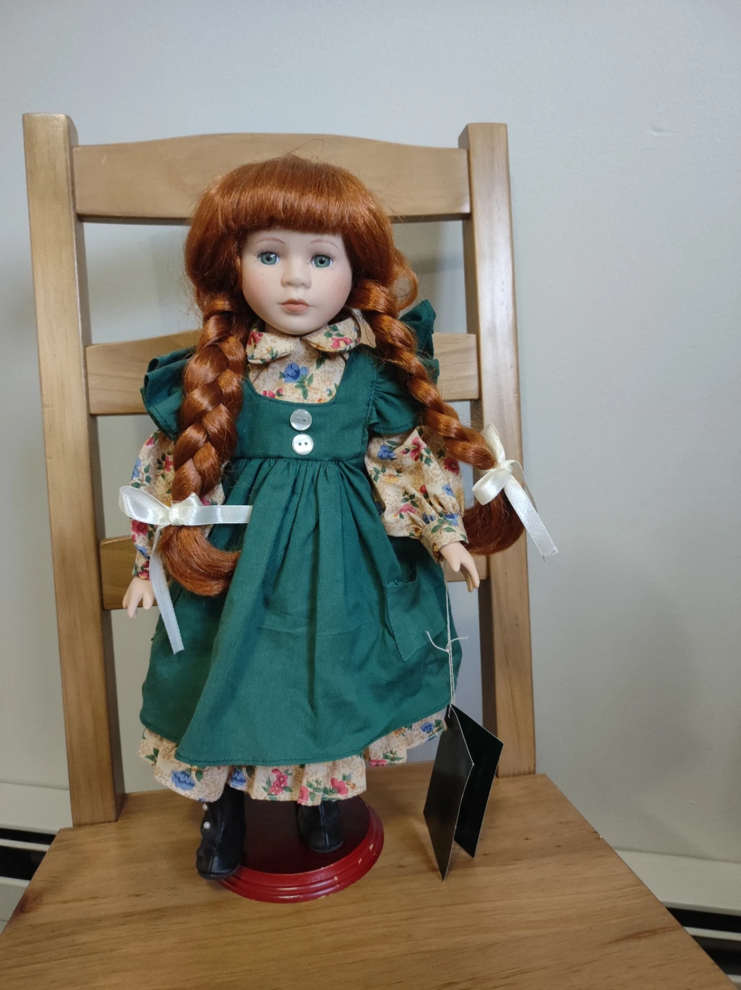 Vintage Porcelain Doll with Red Hair and Green Dress
