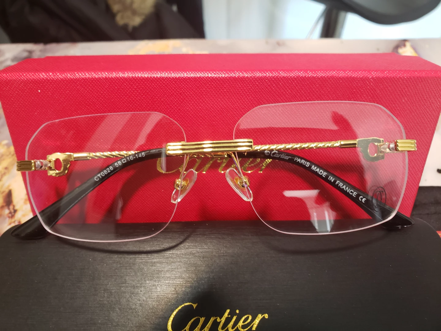 Cartier CT0028 Eyeglasses - Gold/Black Rimless 58-16-145 - photo 3
