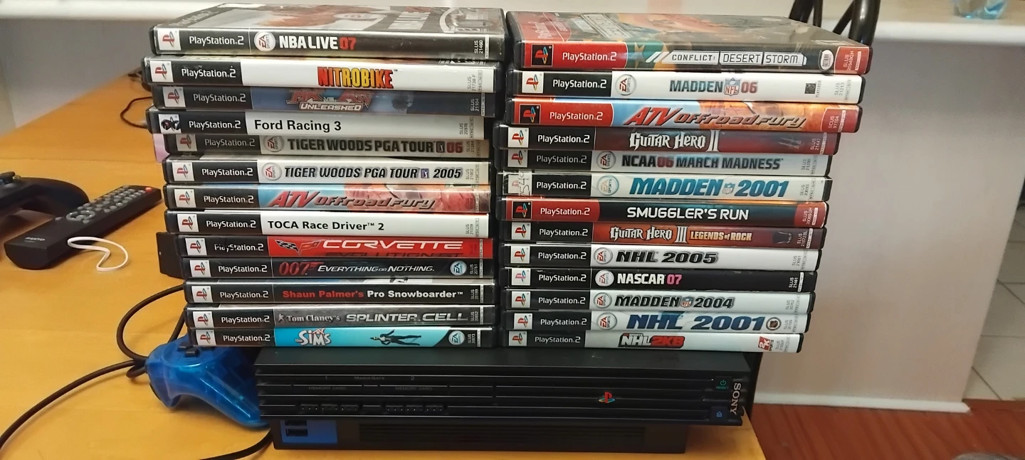 PlayStation 2 Console with Games and Controller