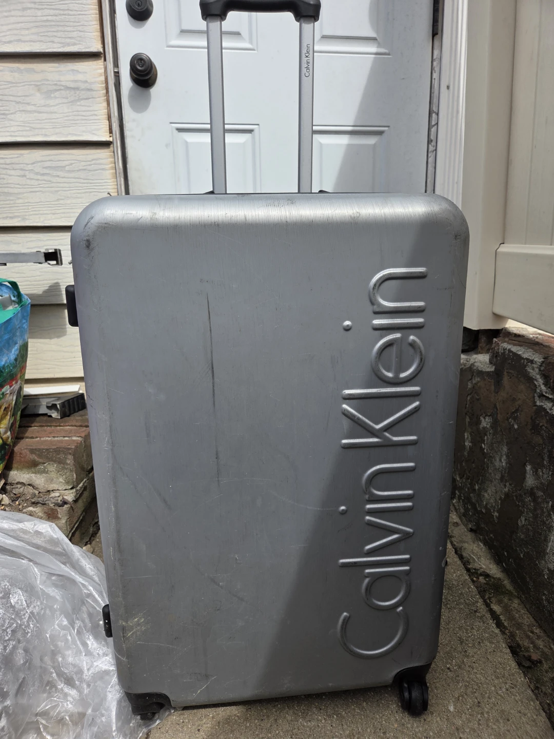 Calvin Klein Silver Hardside Spinner Luggage