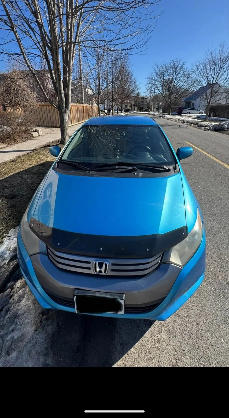 Blue Honda Insight Hybrid