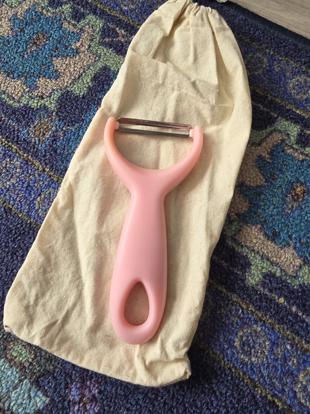Pink food peeler