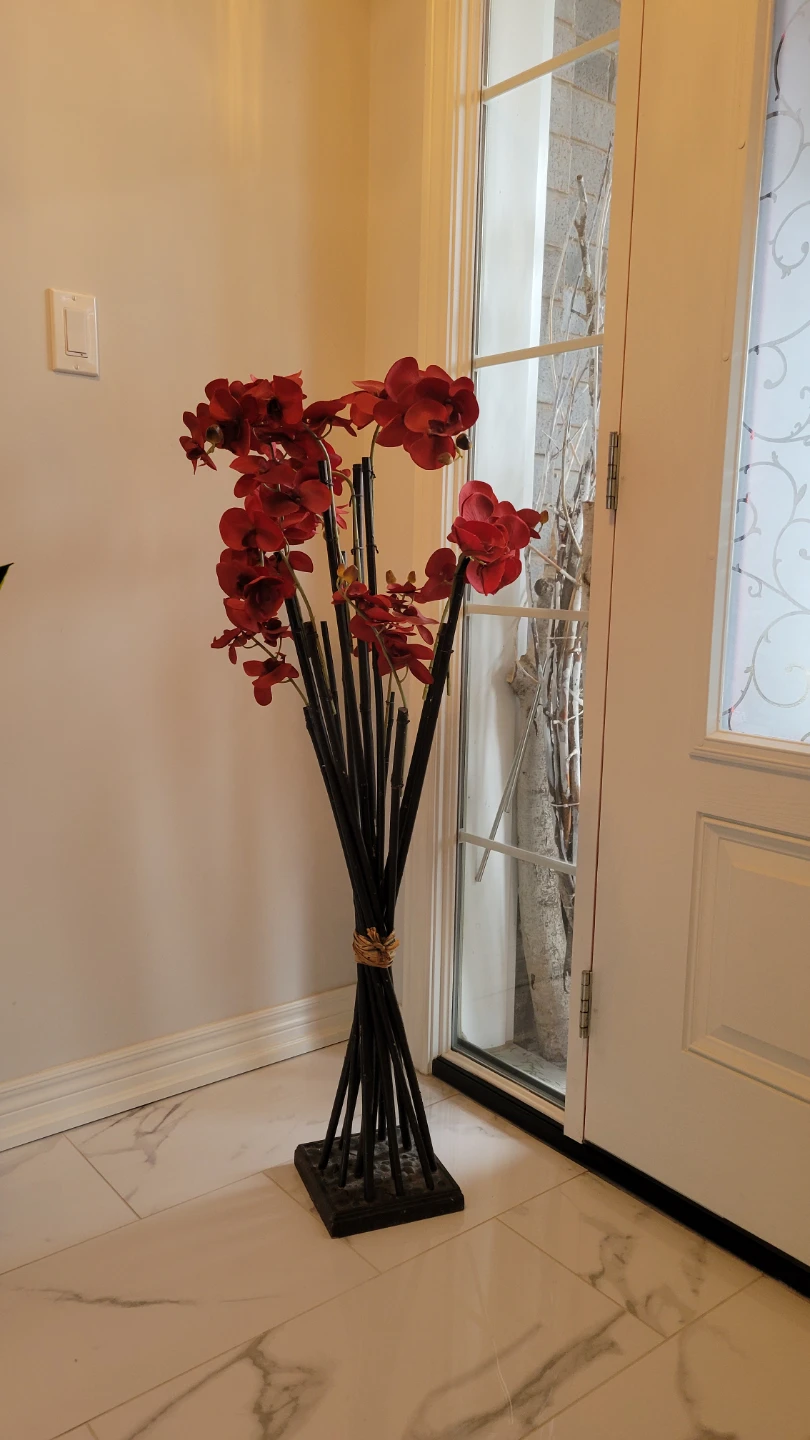 Red Orchid Arrangement with Black Bamboo Stems