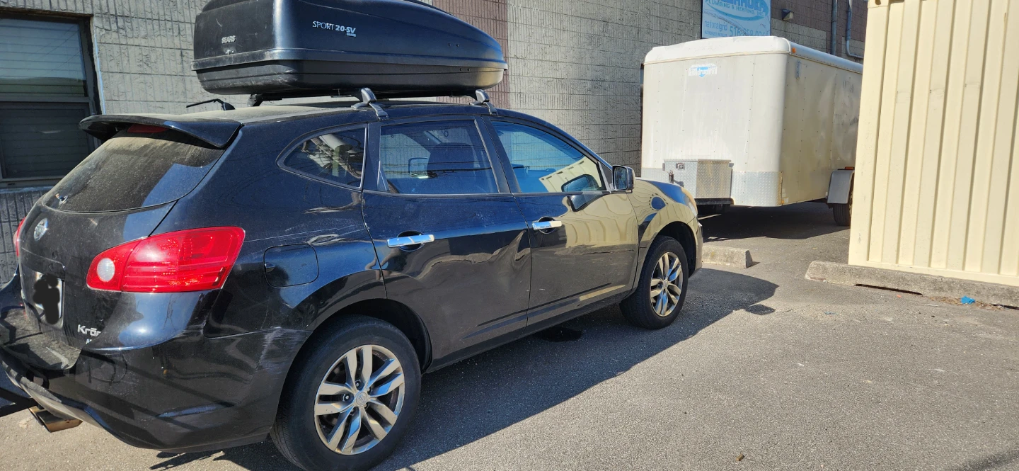 Black Nissan Rogue with Roof Cargo Box - photo 2