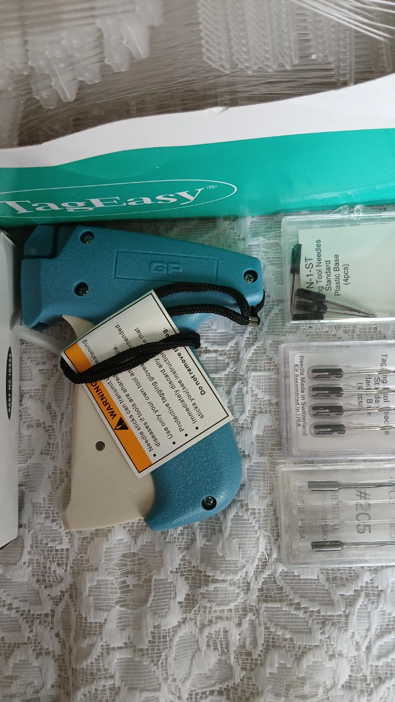Collection of price tag fasteners and gun for $15.00 - photo 4