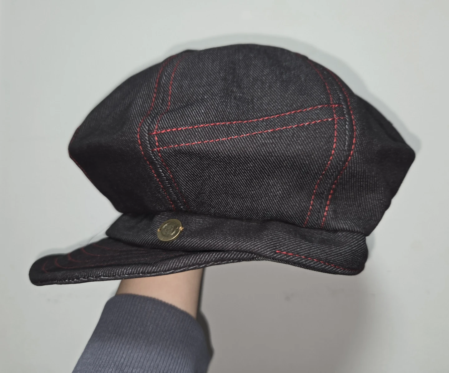 Black Newsboy Cap with Red Stitching