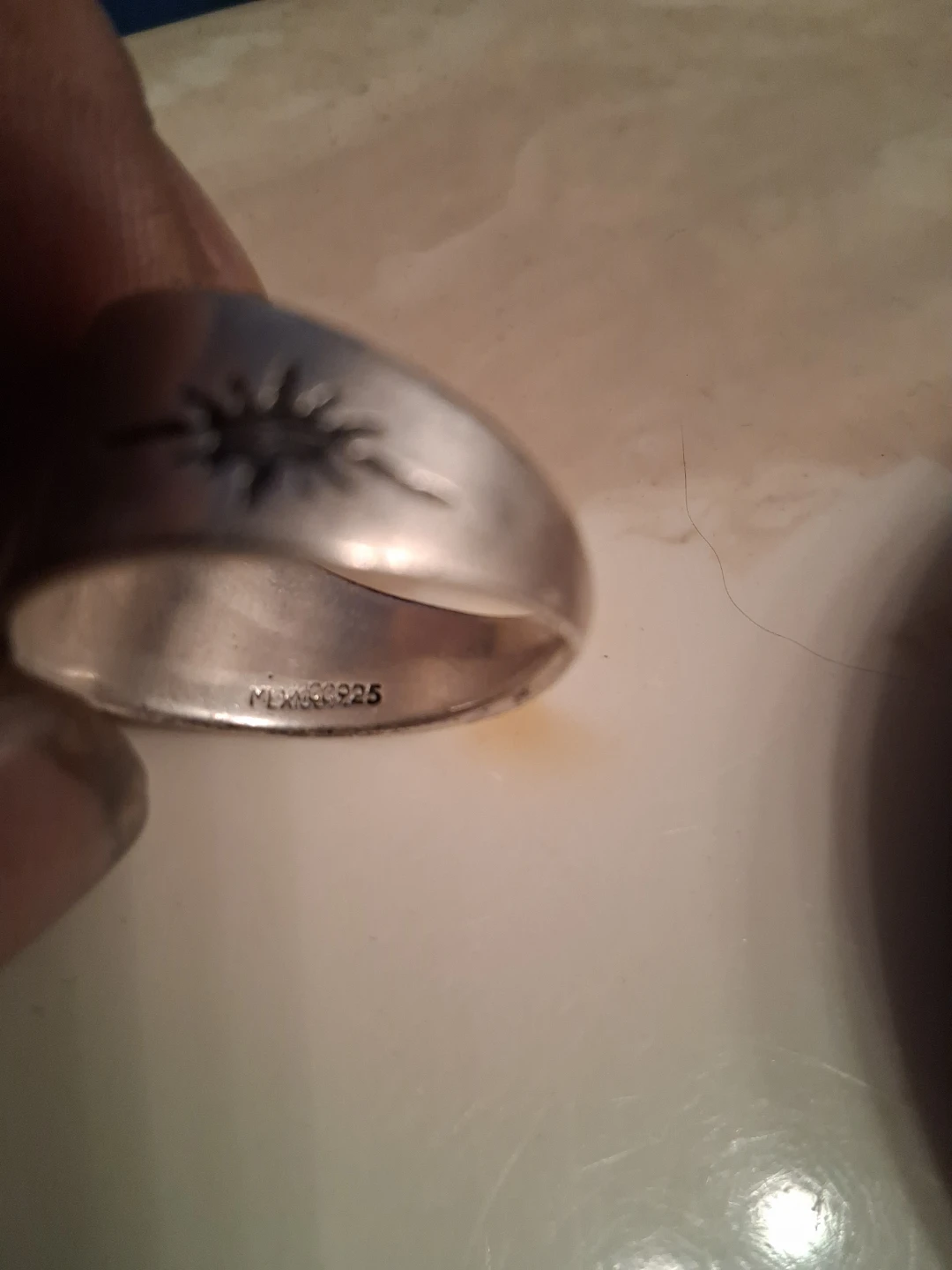 Sterling Silver Ring with Sun Design