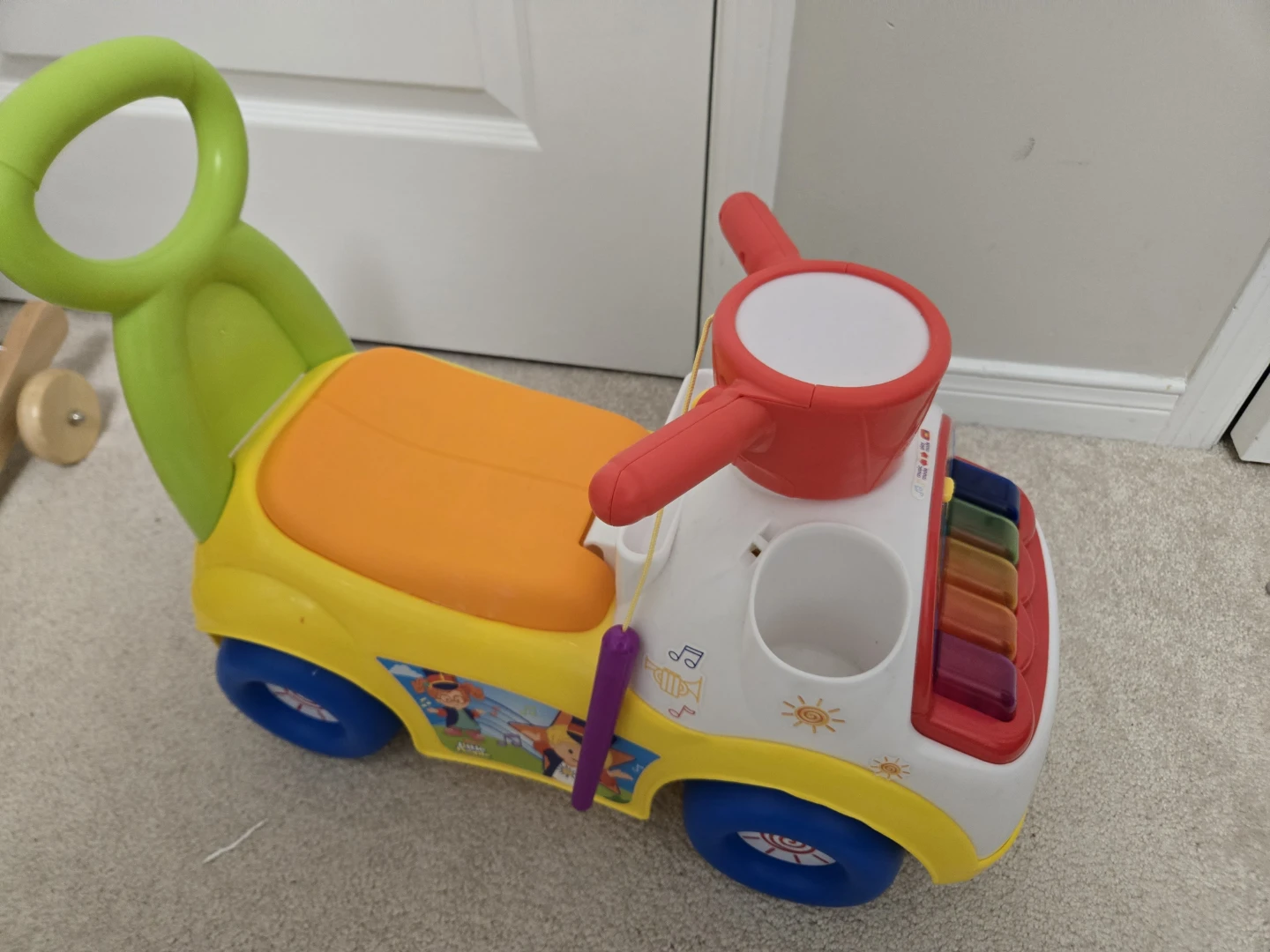 Fisher-Price Little People Music Parade Ride-On Toy