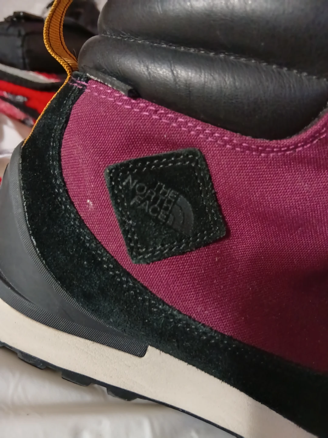 Mens Burgundy North Face boots.