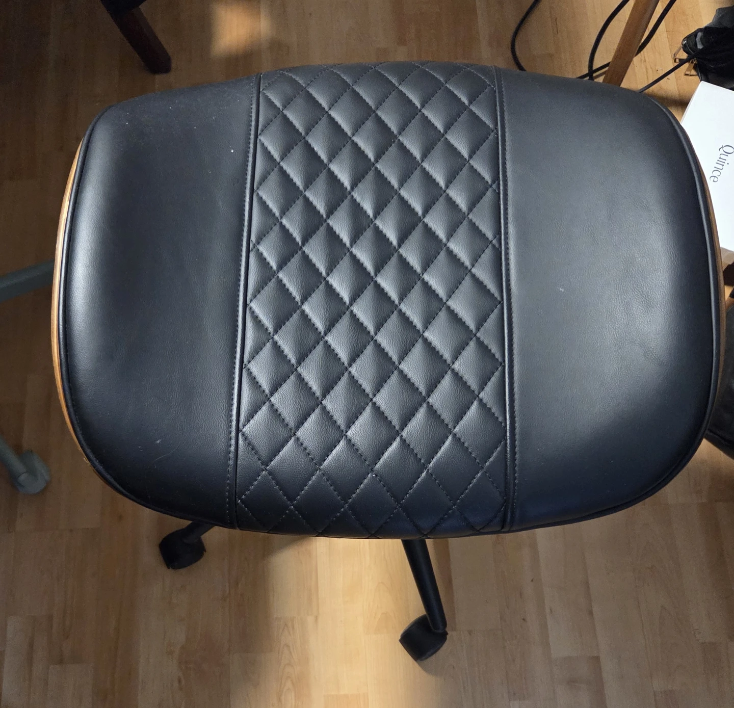 Black Faux Leather Rolling Stool with Quilted Seat