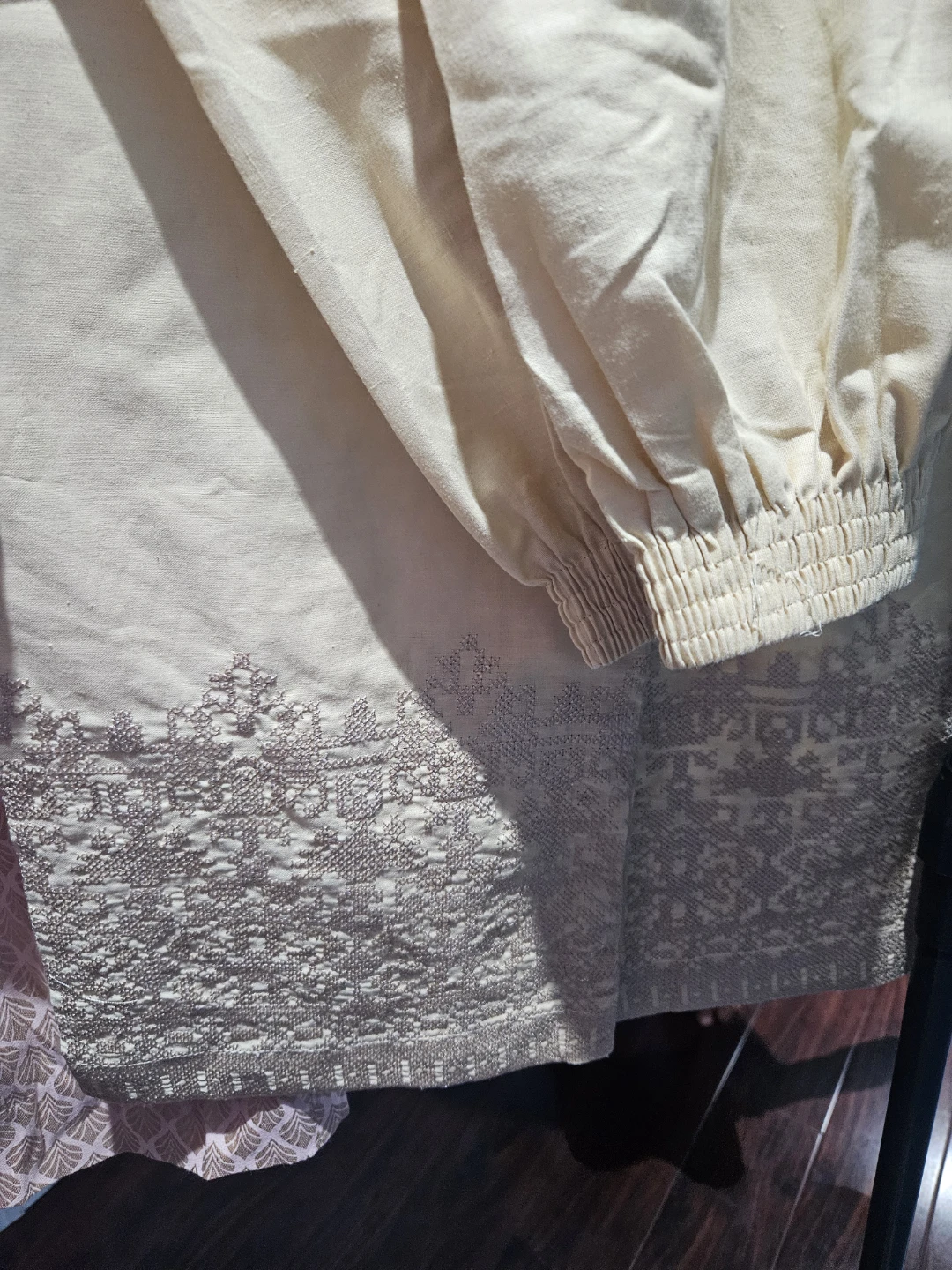 Cream coloured embroidered trousers