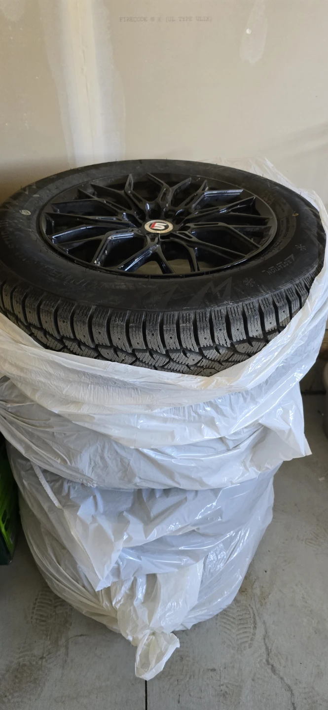 225/65R17 Winter Tires on Black Rims - photo 5