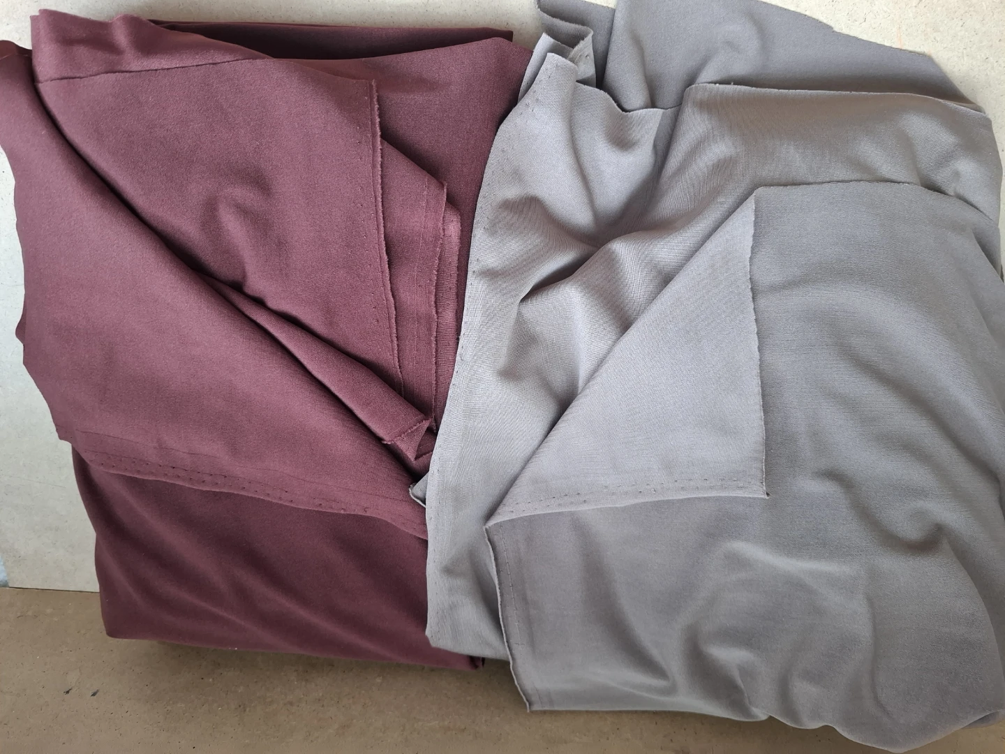 Soft stretch fabric pieces in dusty mauve & warm grey.