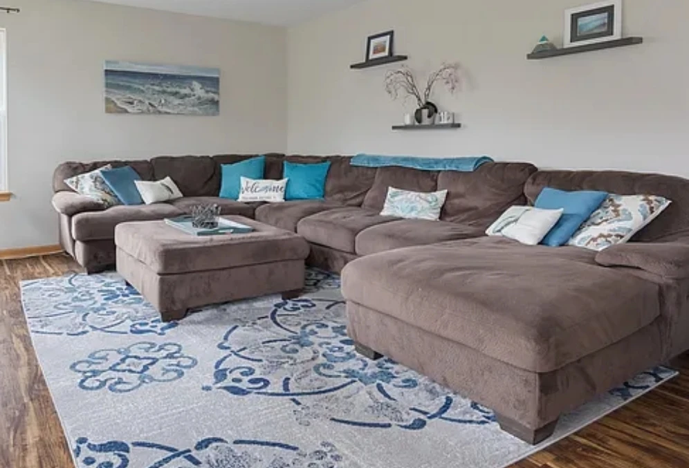 Ashley Furniture Brown Sectional Sofa with Ottoman