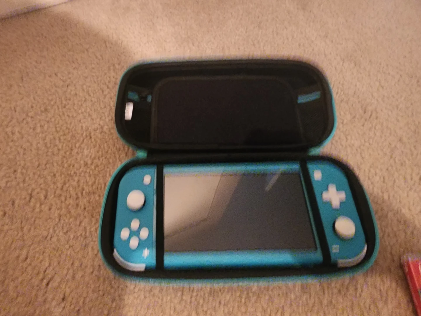 Nintendo Switch Lite with Case and Games