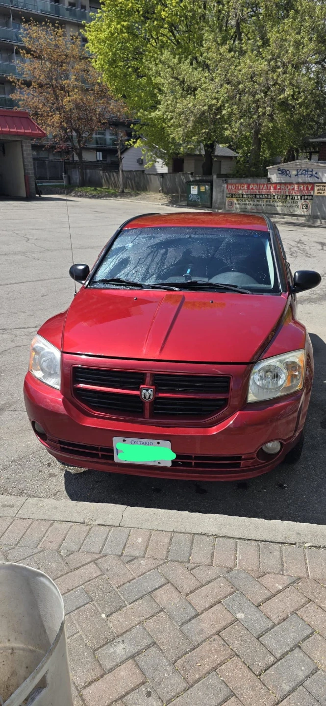 Red Dodge Caliber SXT Hatchback