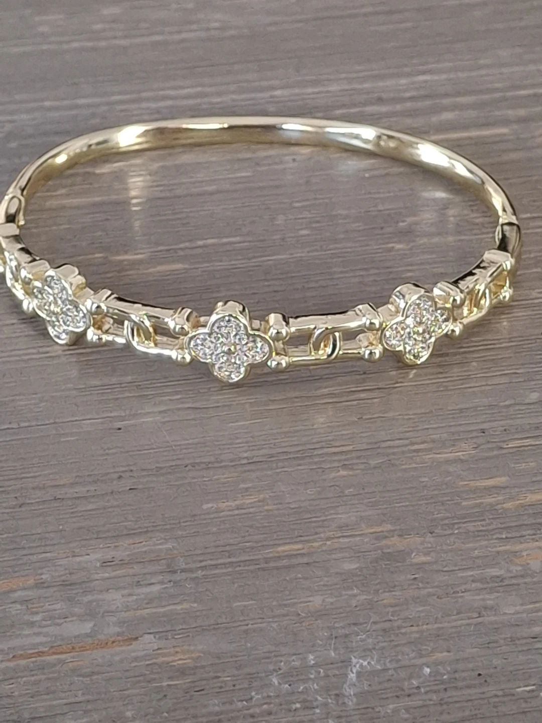 Gold Tone Clover Bangle Bracelet with Crystals
