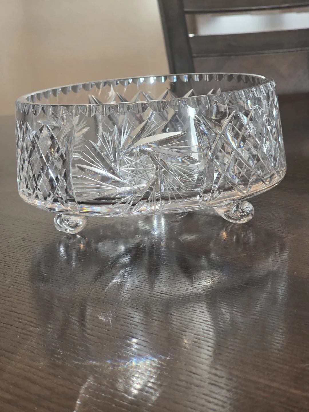 This is a vintage Bohemian crystal bowl featuring a hand-cut