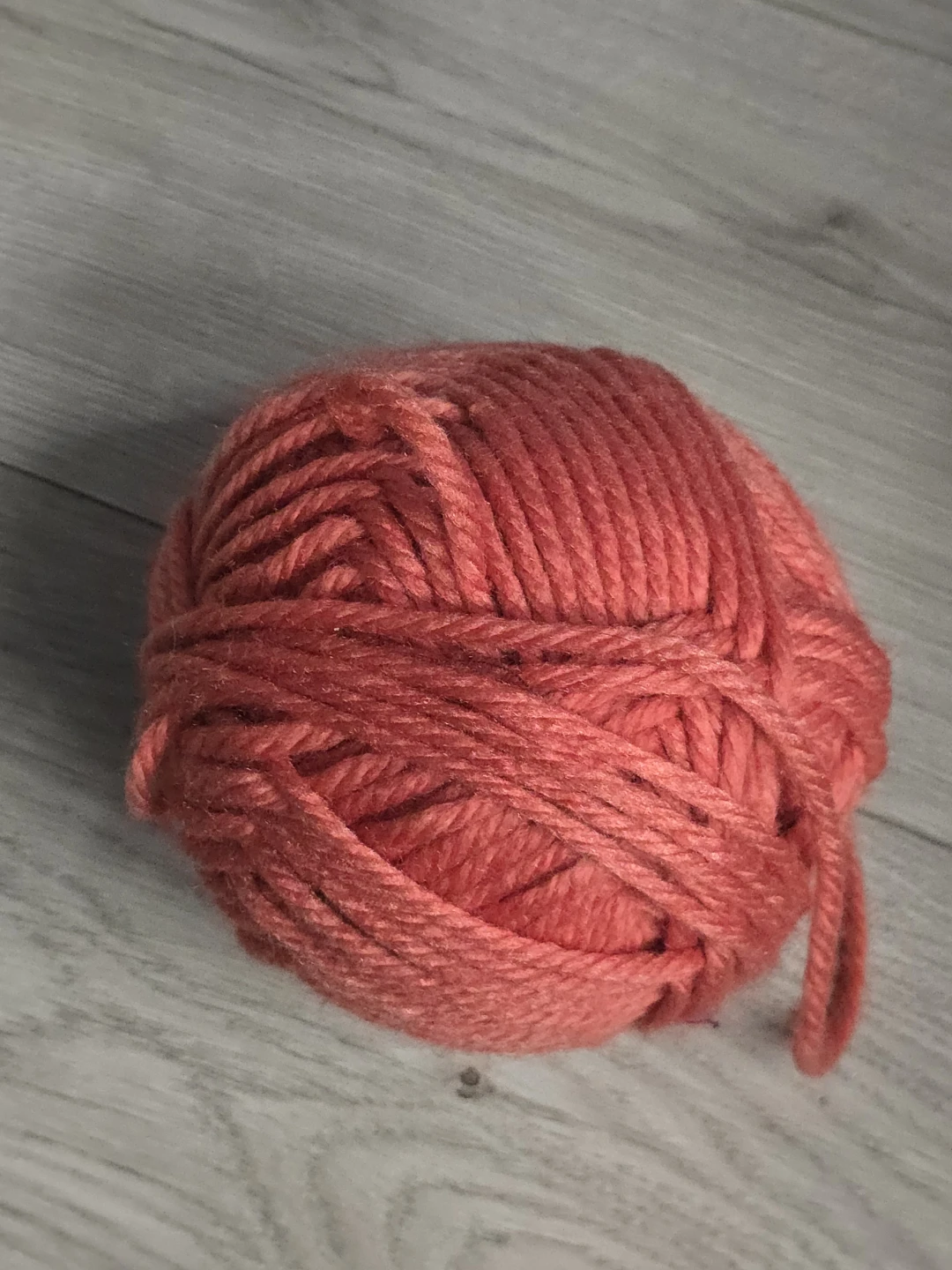 Ball of Coral Yarn