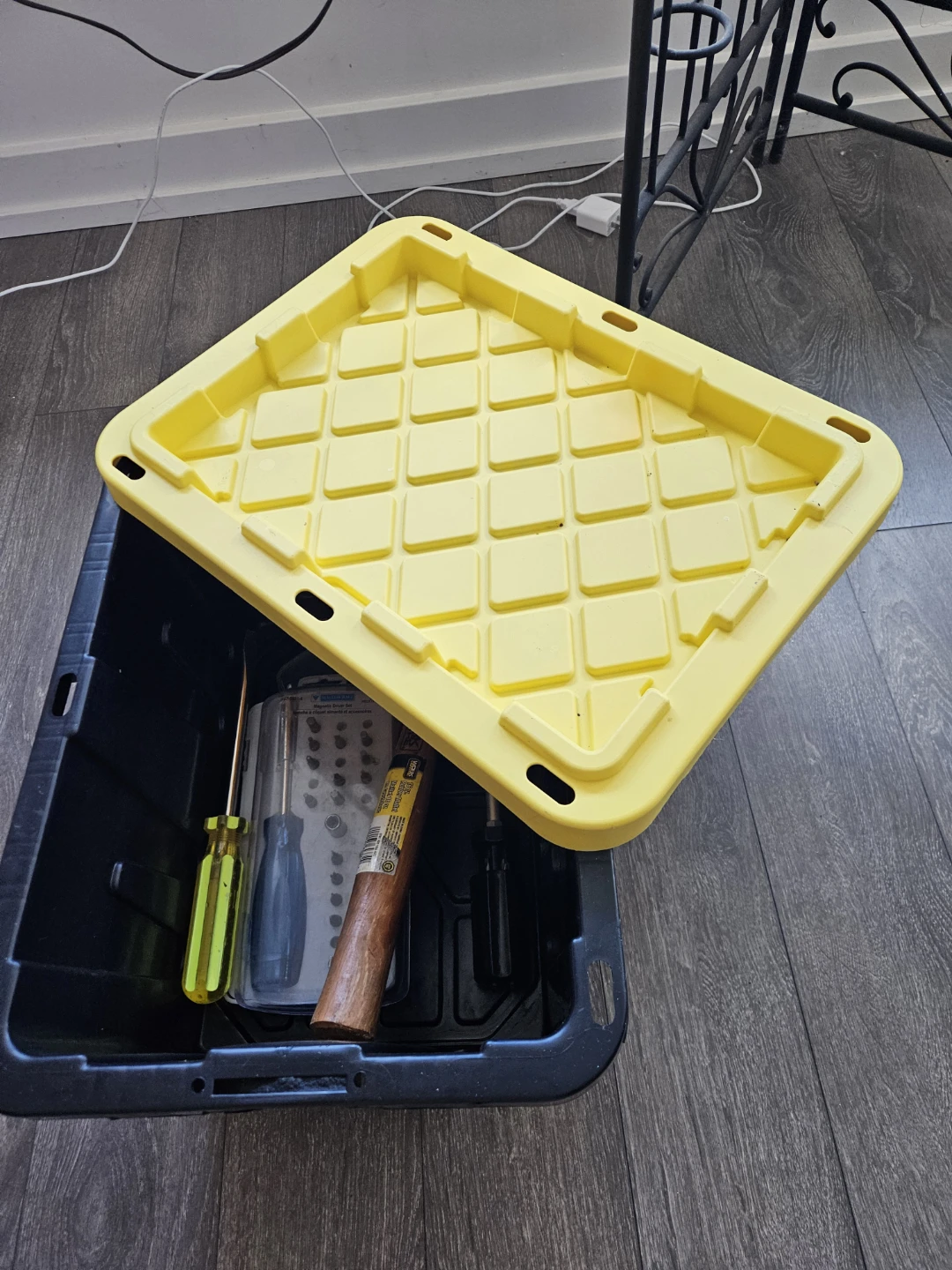 Black Storage Bin with Yellow Lid and Tools