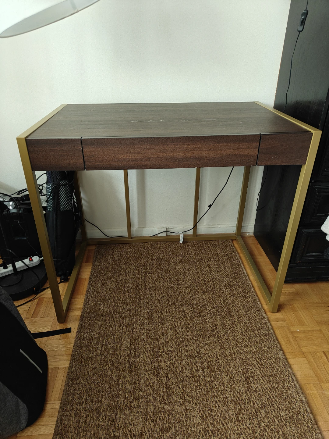 Wooden desk with built-in charging ports