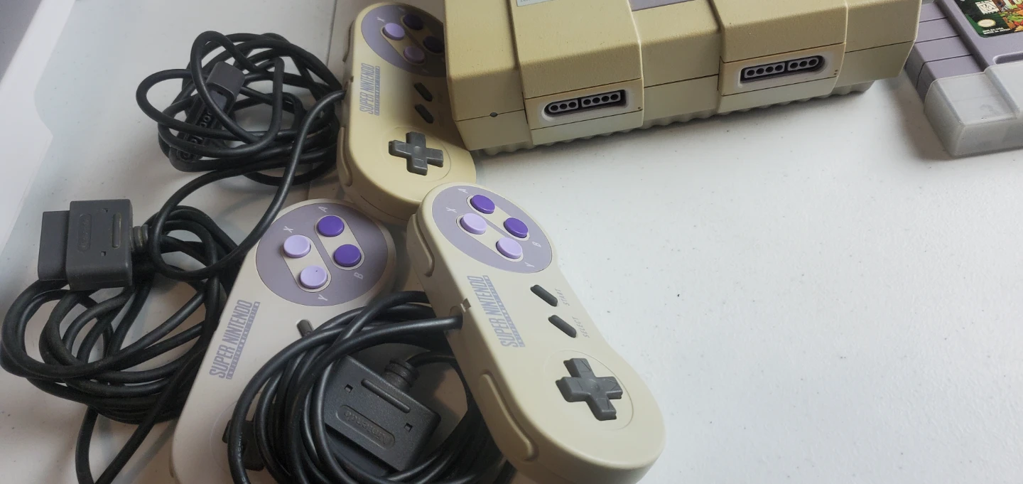 Super Nintendo Console with Games and Controllers - photo 2