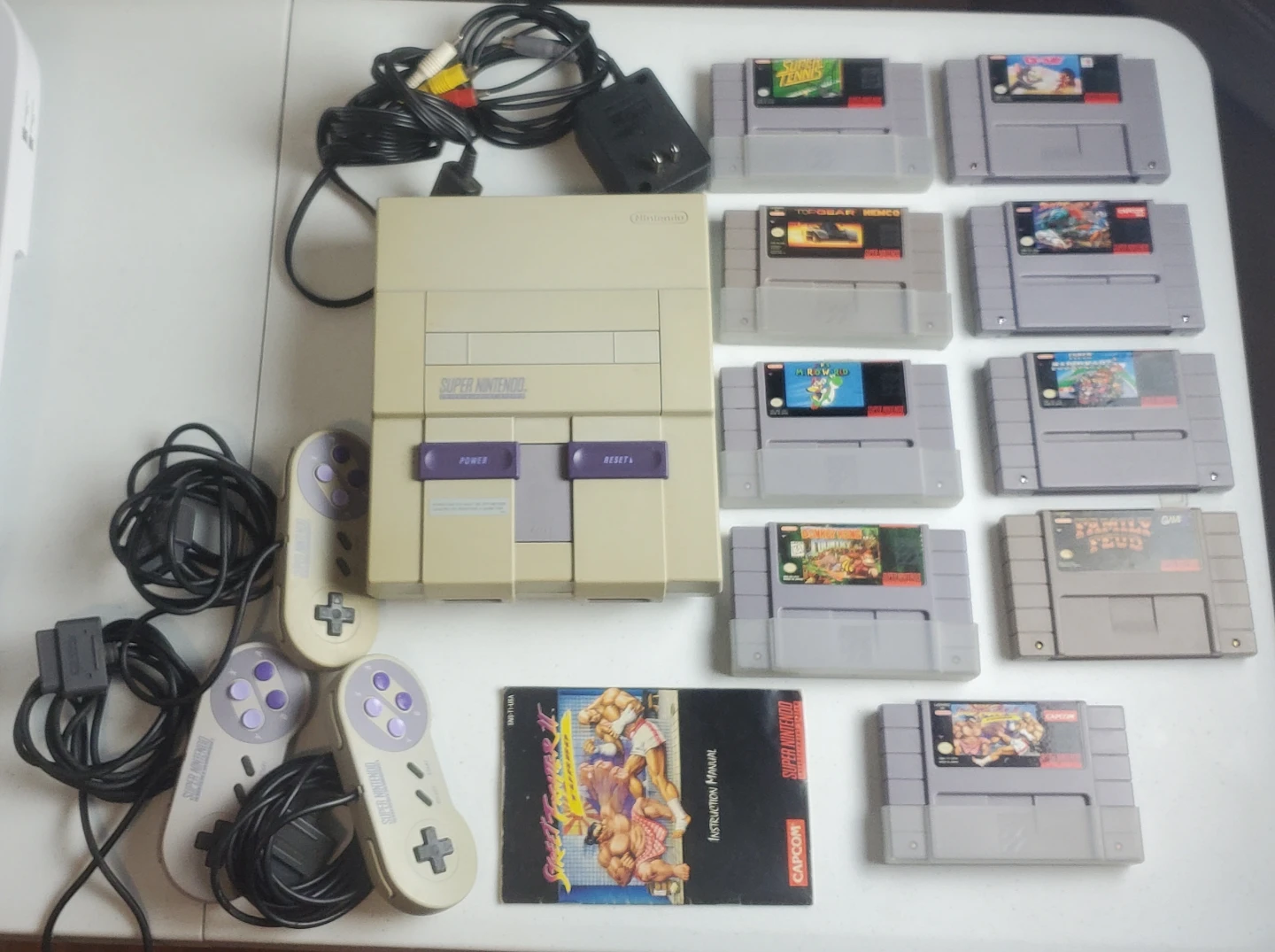 Super Nintendo Console with Games and Controllers