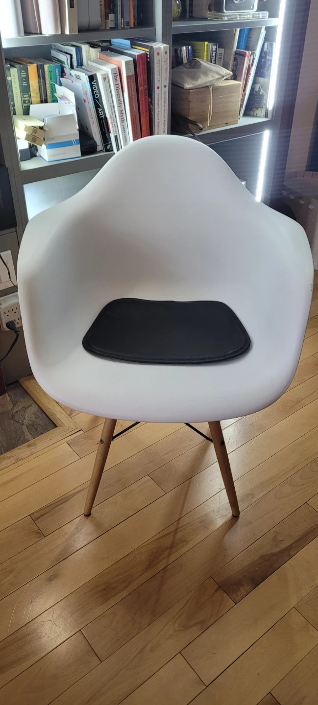Set of 4 White molded chairs with black seat cushion