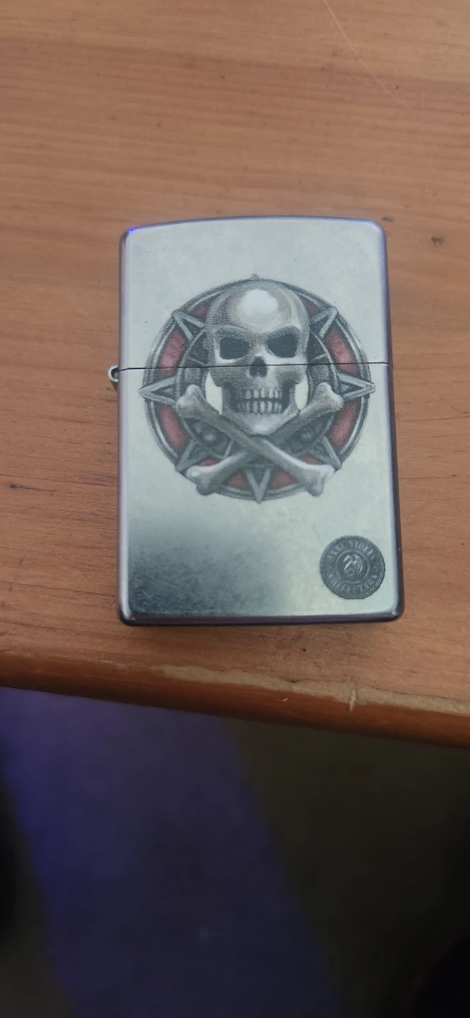 Zippo Lighter with Skull and Crossbones Design