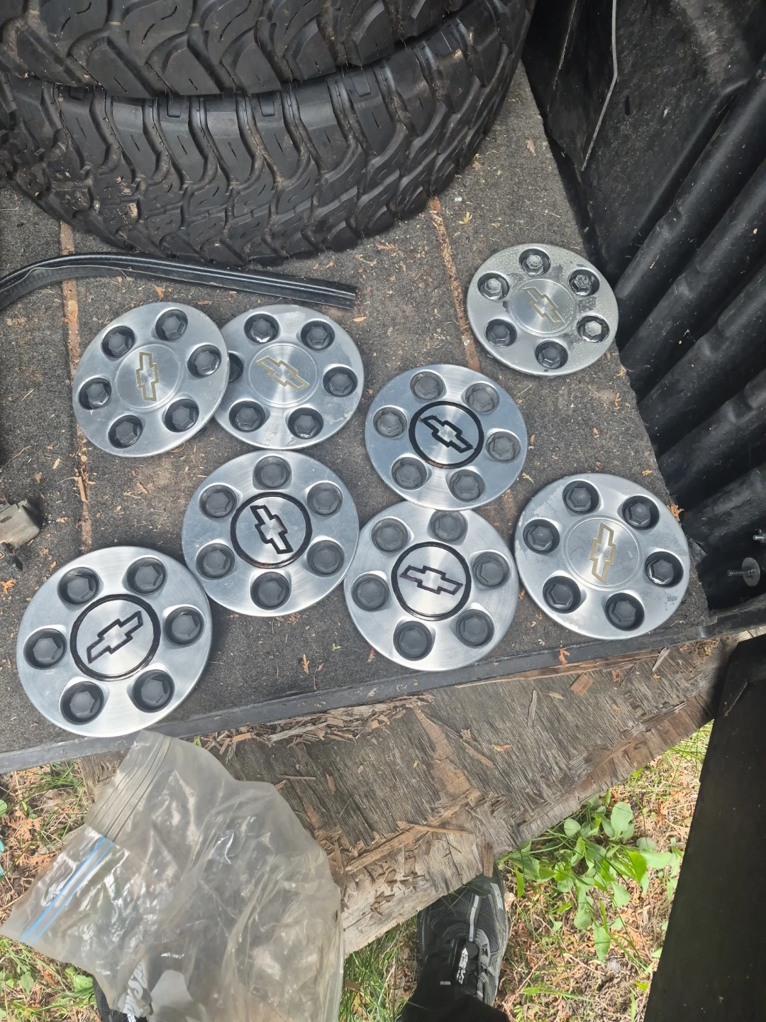 8 Chevrolet Hubcaps and  Rocker Panel tires and rims - photo 4