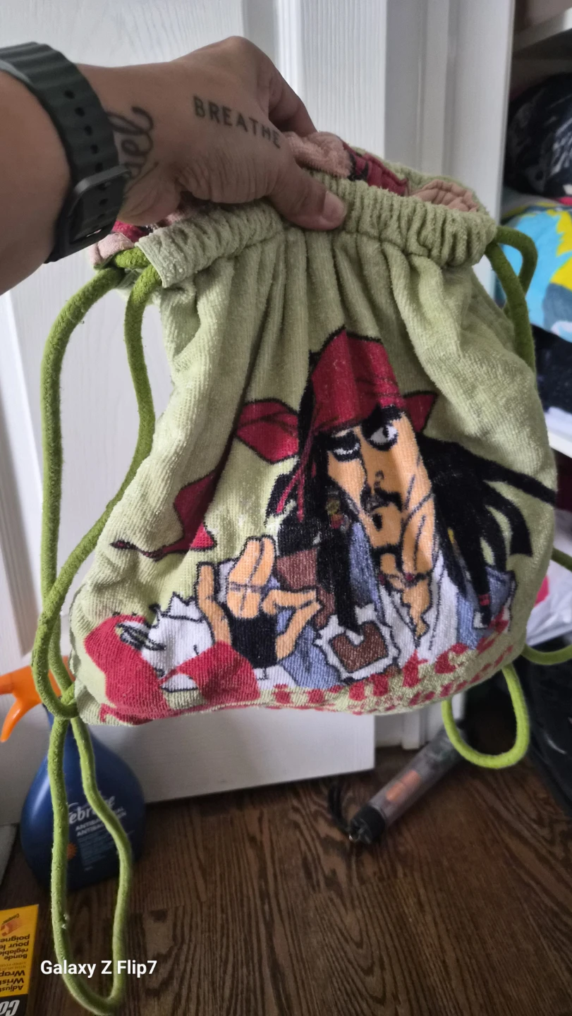 Cars & Pirates Drawstring towels in a bag