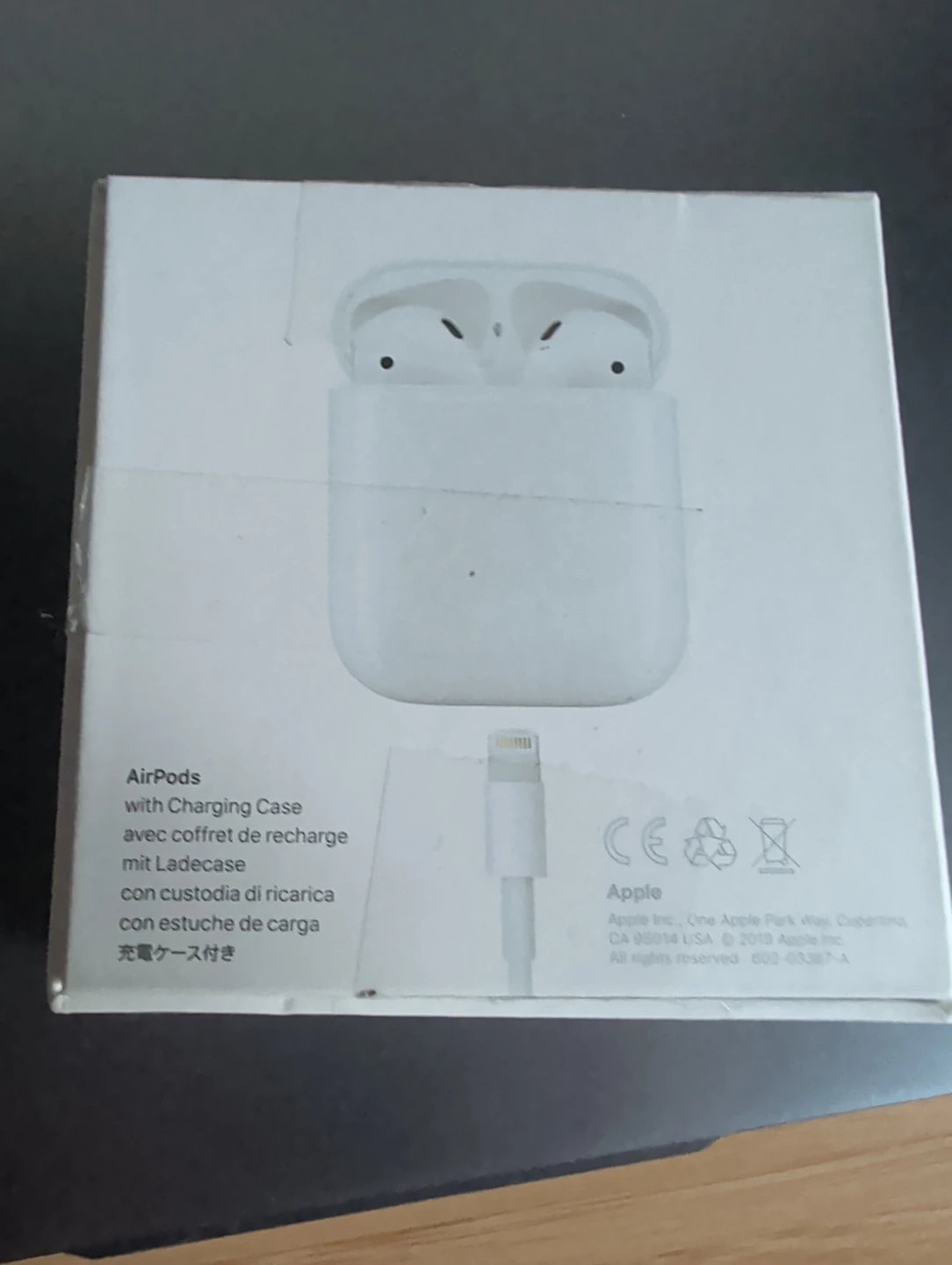 Apple AirPods (2nd Gen) with Charging Case - photo 2