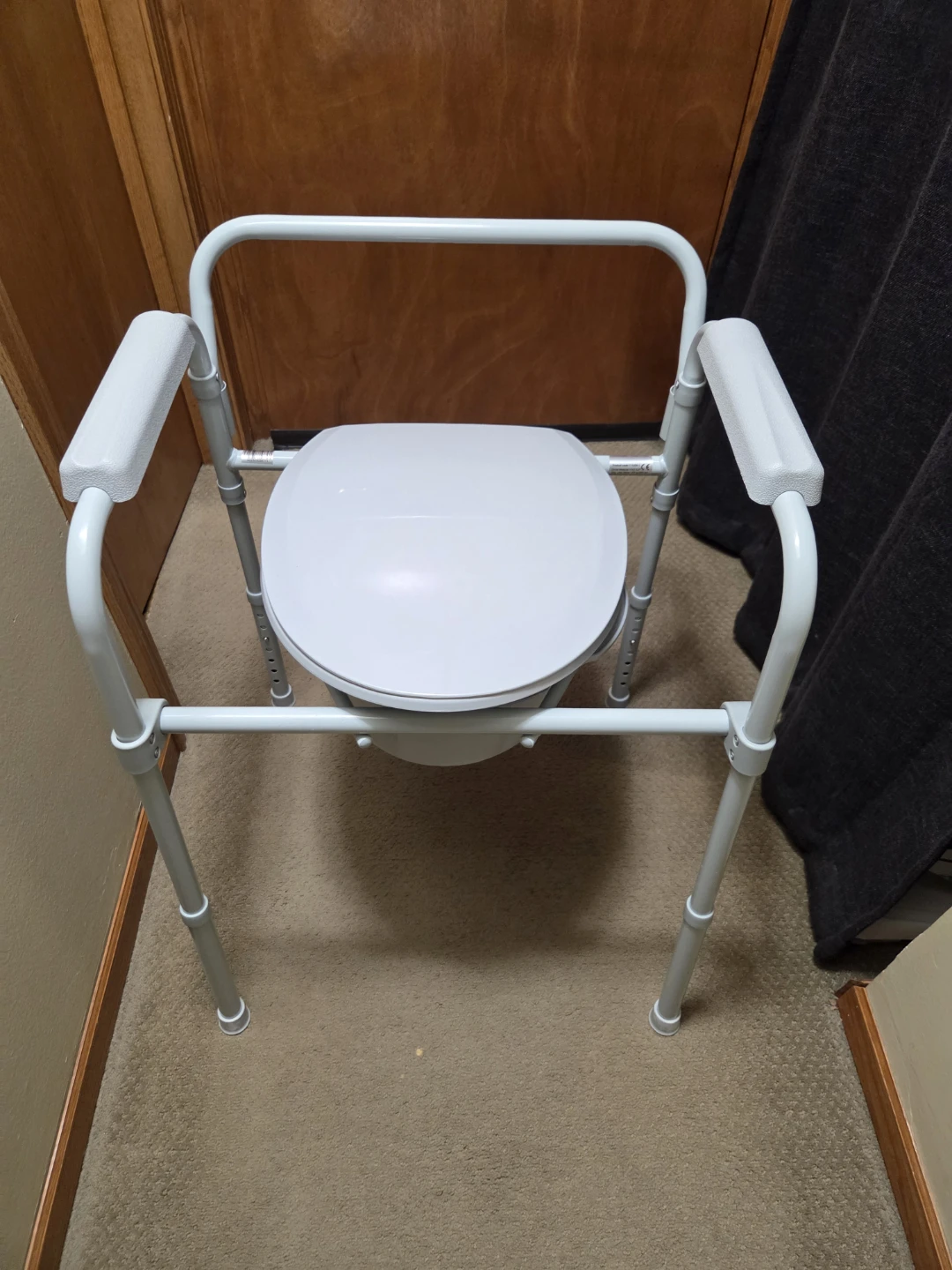 White Commode Toilet Chair with Padded Arms and Bucket