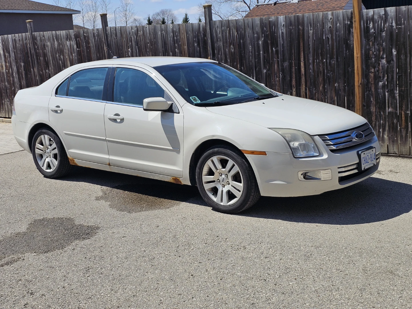 White Ford Fusion Sedan