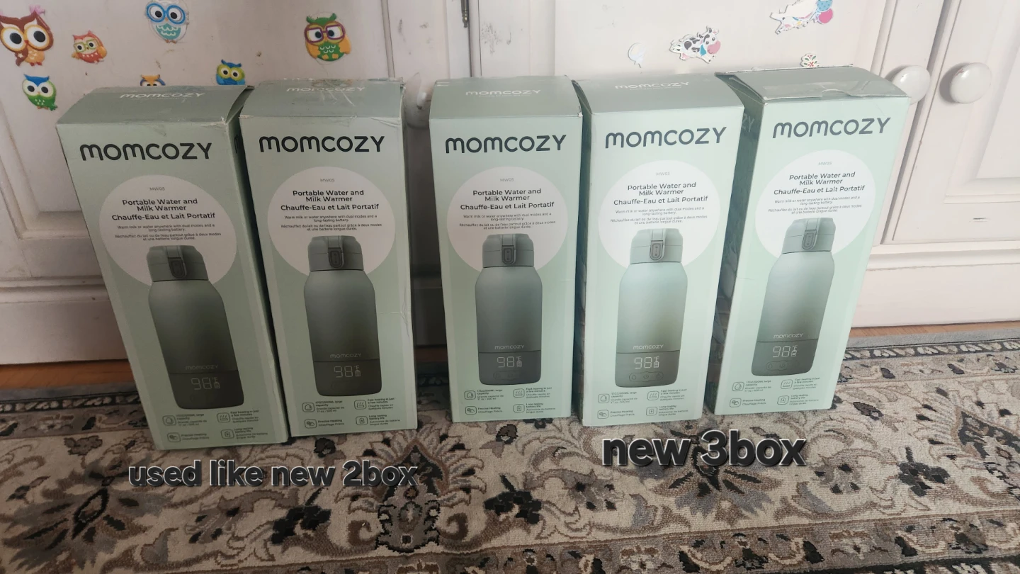 Momcozy Portable Water and Milk Warmer used $50   new $70