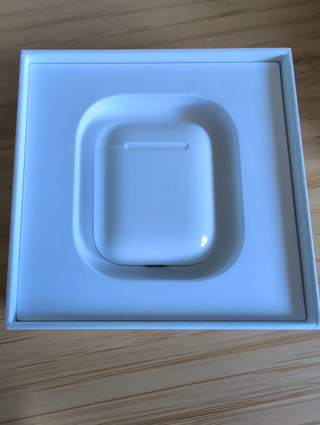 Apple AirPods (2nd Gen) with Charging Case - photo 3
