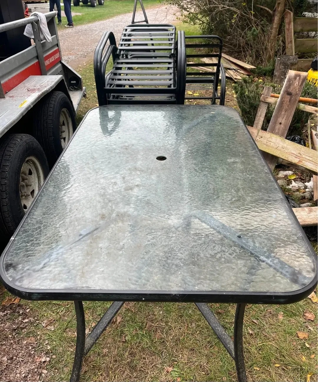 Glass Top Patio Table and 6 Reclining Chairs
